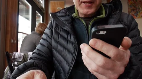 Man drinking coffee and texting Stock Footage 48750623