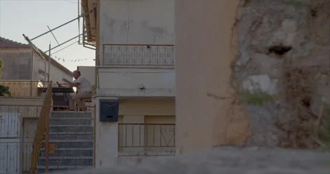 A man drinking coffee on the balcony Stock Footage 314839739