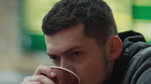 Man drinking coffee in cafe Stock Footage 61865396