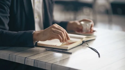 Man Drinking Coffee At The Cafe Stock Footage 126128754