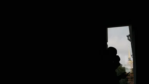 Man drinking coffee near the window Stock Footage 238374717