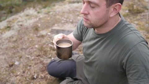 Man Drinking Coffee Outdoors During Camping Trip 库存影片 334048992