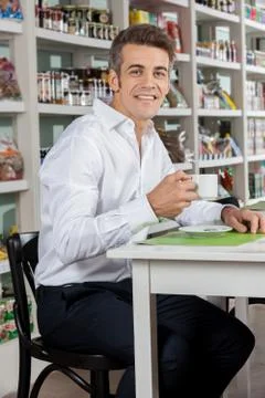 Man drinking a coffee Stock Photos