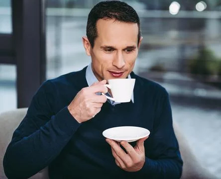 Man drinking coffee Stock Photos