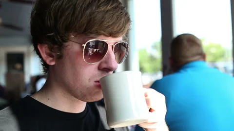 Man Drinking Coffee in Slow Motion Stock Footage 40292200