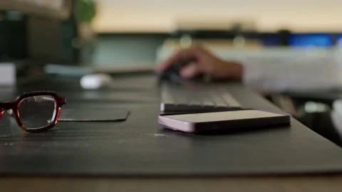 Man drinking coffee while working on computer Stock Footage 220445098
