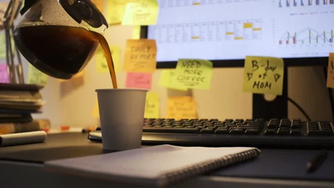 Man drinking coffee while working late indoors Vídeos de archivo 279768713