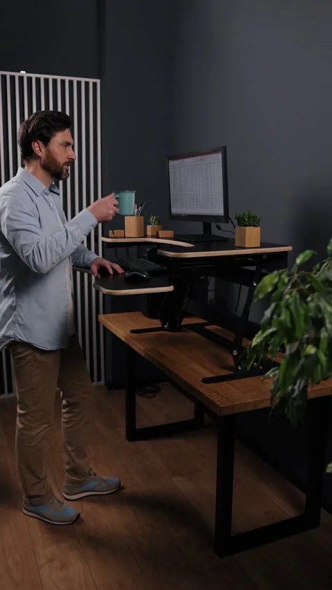 Man drinking coffee, Workspace latte, Desk caffeine Stock Footage 297187894