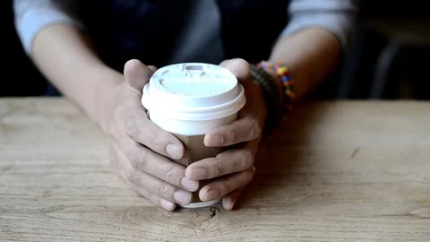 A man drinking a cup of hot black coffee (americano), Paper cup Stock Footage 78520803