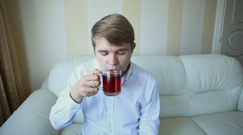 Man drinking a cup of tea Stock Footage 50621003