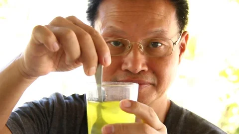 Man drinking electrolyte  Stock Footage 86221956