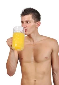 Man drinking juic Stock Photos