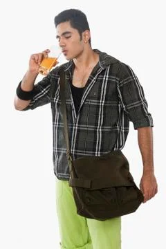 Man drinking juice Stock Photos