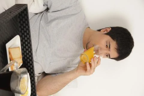 Man drinking a juice Stock-Fotos