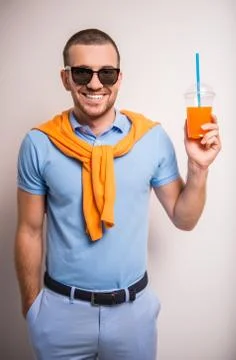 Man drinking juice Stock Photos