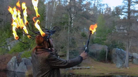 Man drinking liquid paraffin and spitting fire Stock Footage 145014088