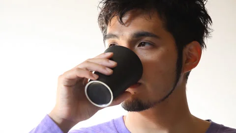 Man drinking from mug Video stock 161969874