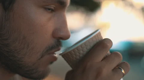 Man drinking from a paper Cup Stock Footage 64699233