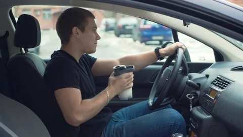 Man drinking protein shake in car. Stock Footage 69751165