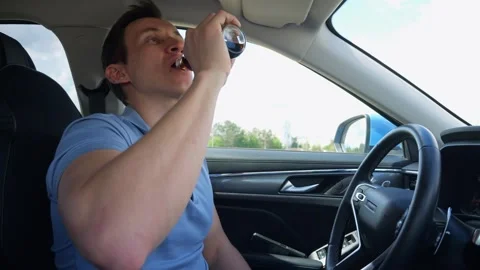 Man drinking soda in car Stock-Footage 330105152