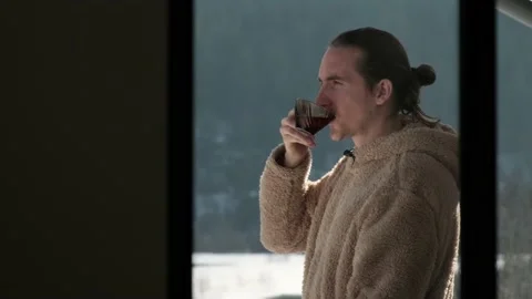 Man drinking tea on balcony. Stock Footage 168612623