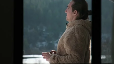 Man drinking tea on balcony. Stock Footage 168612706