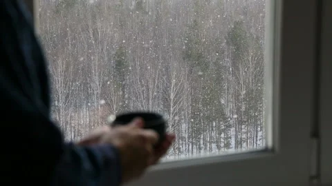 Man drinking tea near the window Stock Footage 126700238