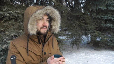 Man is drinking tea in the park Stock Footage 86367661