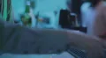 Man drinking tequila at bar counter, barman serving him HD Footage