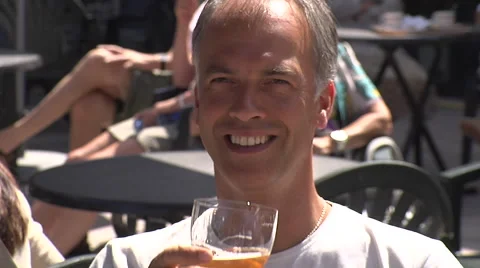 Man drinking traditional Belgian beer on hot day Stock Footage 49138877