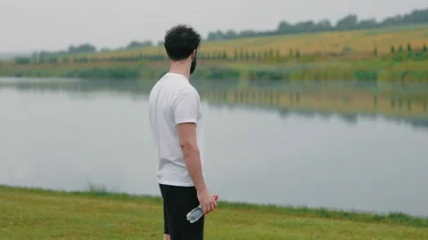 Man drinking water from a bottle Stock Footage 160350802