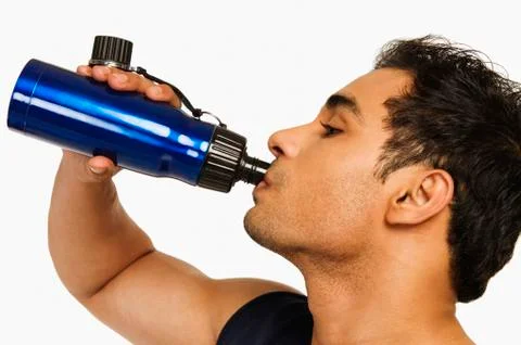 Man drinking water from a bottle Stock Photos
