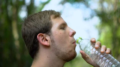 Man Drinking Water Stock Footage 100216173
