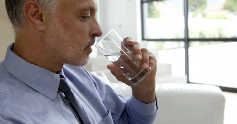 Man drinking water glass Stock Footage 63433904