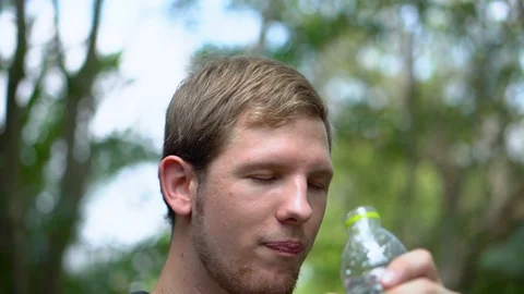 Man Drinking Water From Plastic Bottle Stock Footage 100216105