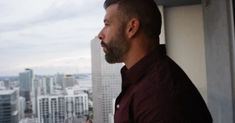 Man drinking whisky while smoking cigar Stock Footage 116349294