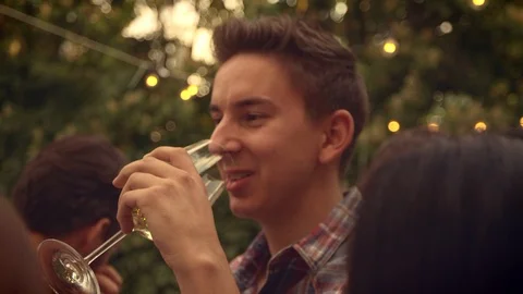 Man drinking wine outside Stock Footage 102896221