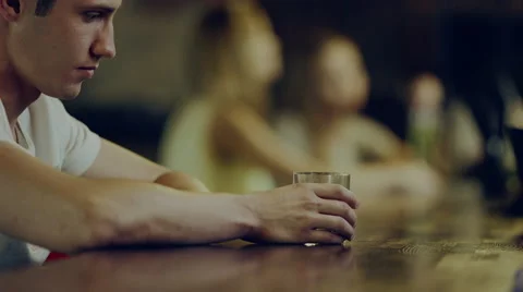Man drinks alcohol Stock Footage 67887972