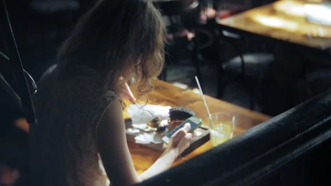 Man drinks a cocktail at a restaurant Stock Footage 92096579