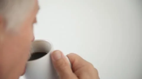 Man drinks cup of coffee Stock Footage 11802876