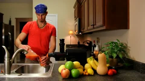 Man Drinks Fresh Juice Stock Footage 17473799