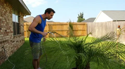 Man Drinks from Hose Stock Footage 11694310