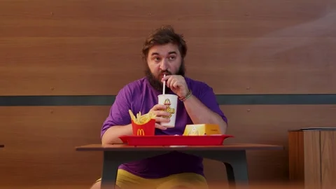 Man drinks lemonade, sweet soda water drink Coca-Cola Vídeo Stock 338312894