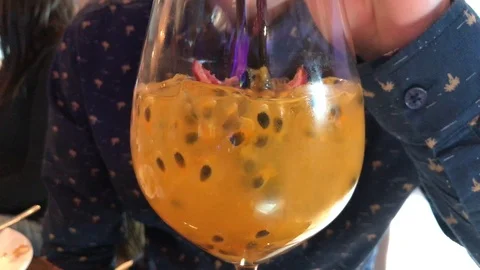 Man drinks mango cocktail in a restaurant Stock-Footage 112520456