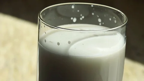Man drinks milk Stock Footage 74843524