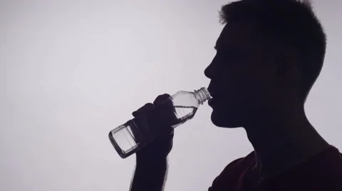 Man drinks from a plastic bottle 4 Stock Footage 62743029