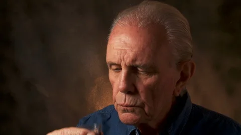 Man drinks a shot Stock Footage 108484949