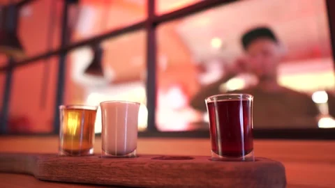 Man drinks strong alcohol in the bar. Set of cocktails close-up. Alcohol Stock Footage 178498787