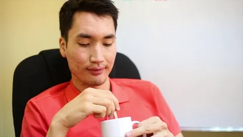 Man drinks a tea Stock Footage 80611335