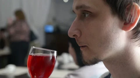 Man drinks wonderful juice Stock Footage 48806567